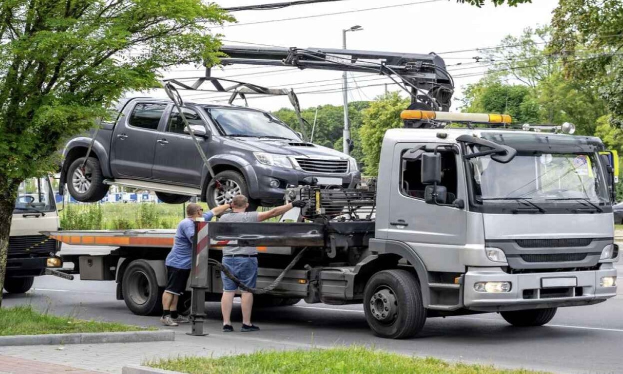 Junk car removal service removing unwanted vehicles